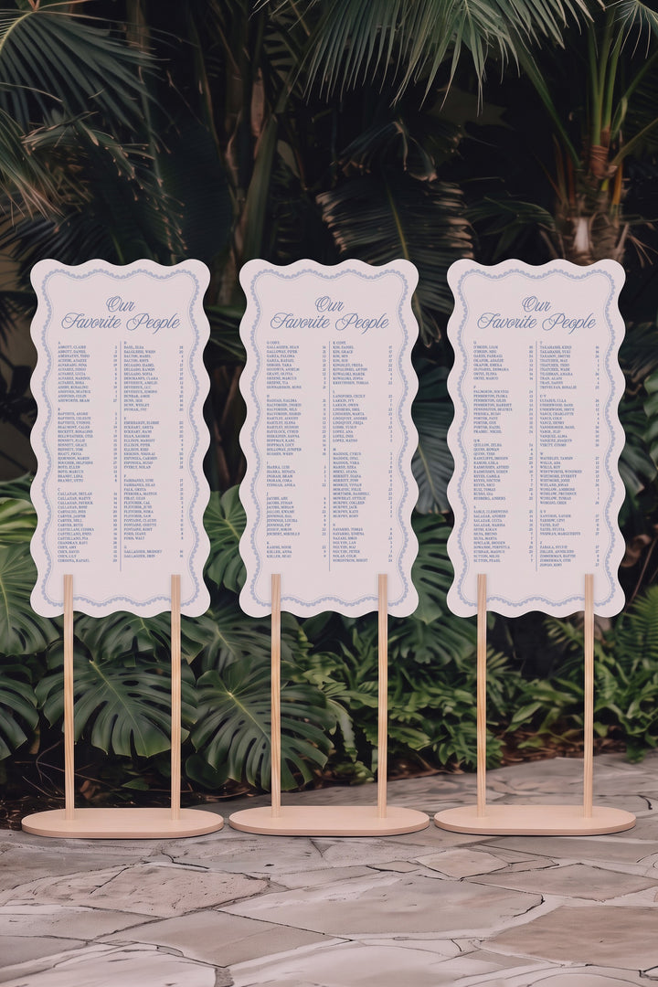 Three panel Powder blue wavy edge wedding seating chart on matching stands, guests A to Z with table numbers #shape_Wavy#color_Powder