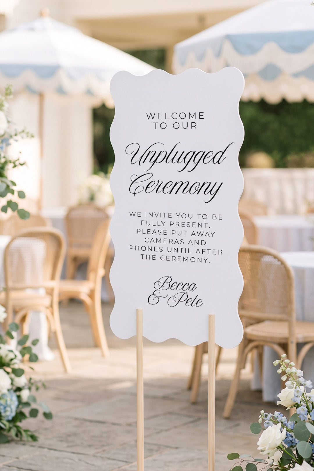 Wavy unplugged ceremony sign beside a cafe-style wedding reception #shape_Wavy#size_Signature