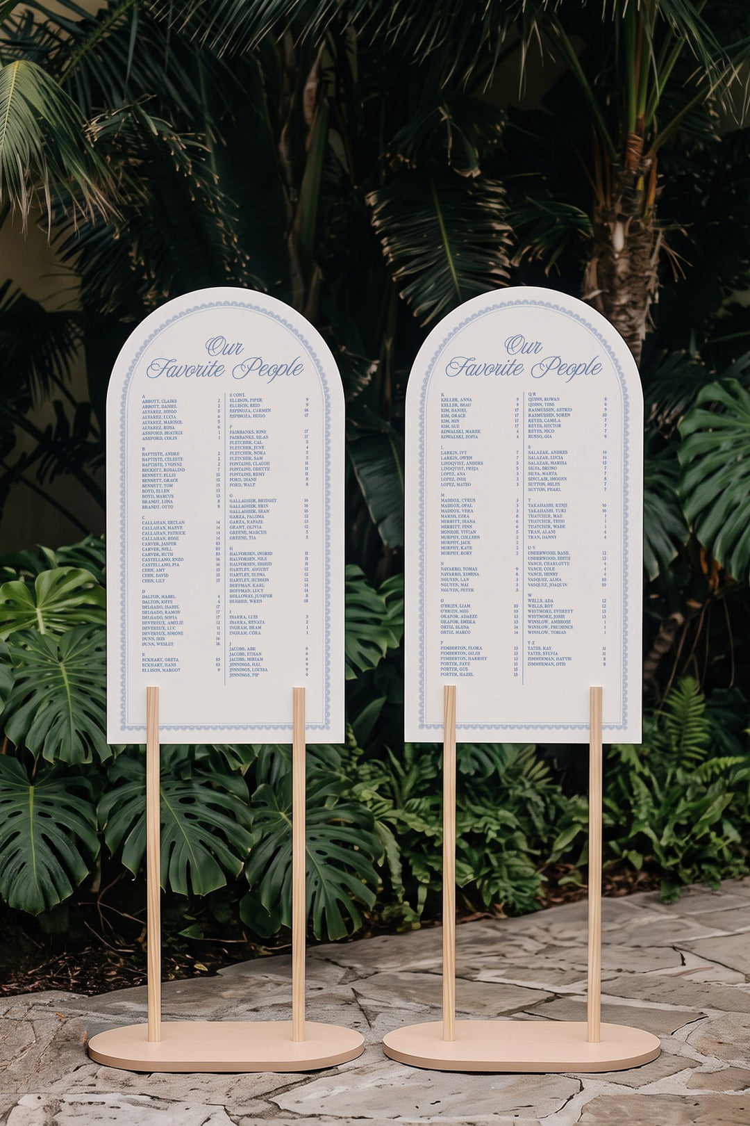 Two panel Powder blue arch wedding seating chart on matching stands, guests A to Z with table numbers #shape_Arch#color_Powder