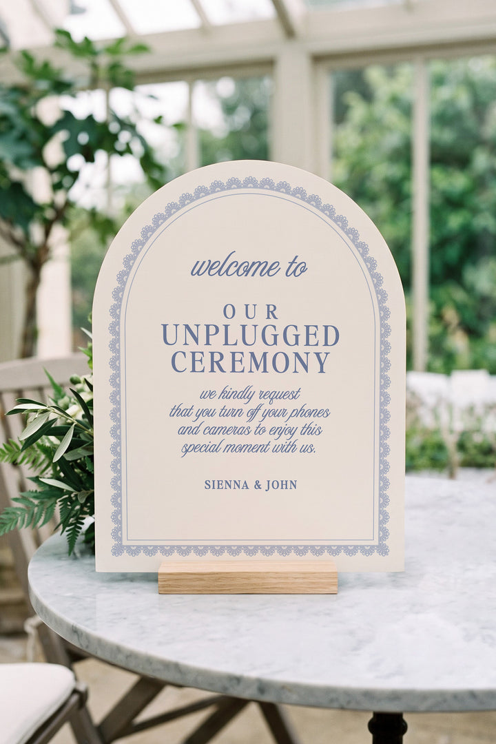 Powder blue arch unplugged ceremony sign with a lace border #shape_Arch#color_Powder