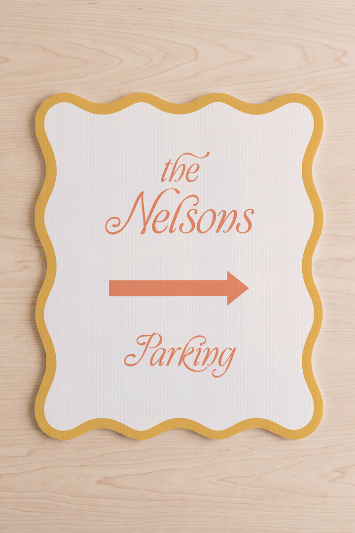 Sunkissed gold wavy wedding directional sign shown flat, family name above the arrow #Color_Sunkissed
