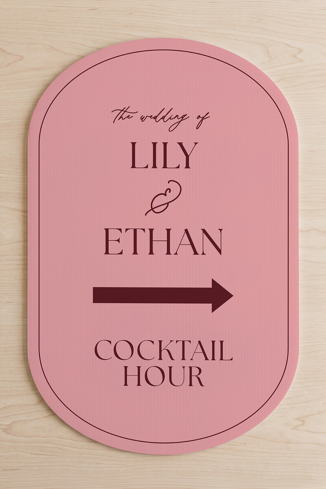 Rosé pink pill wedding directional yard sign shown flat, the couple's names above the arrow #Color_Rosé